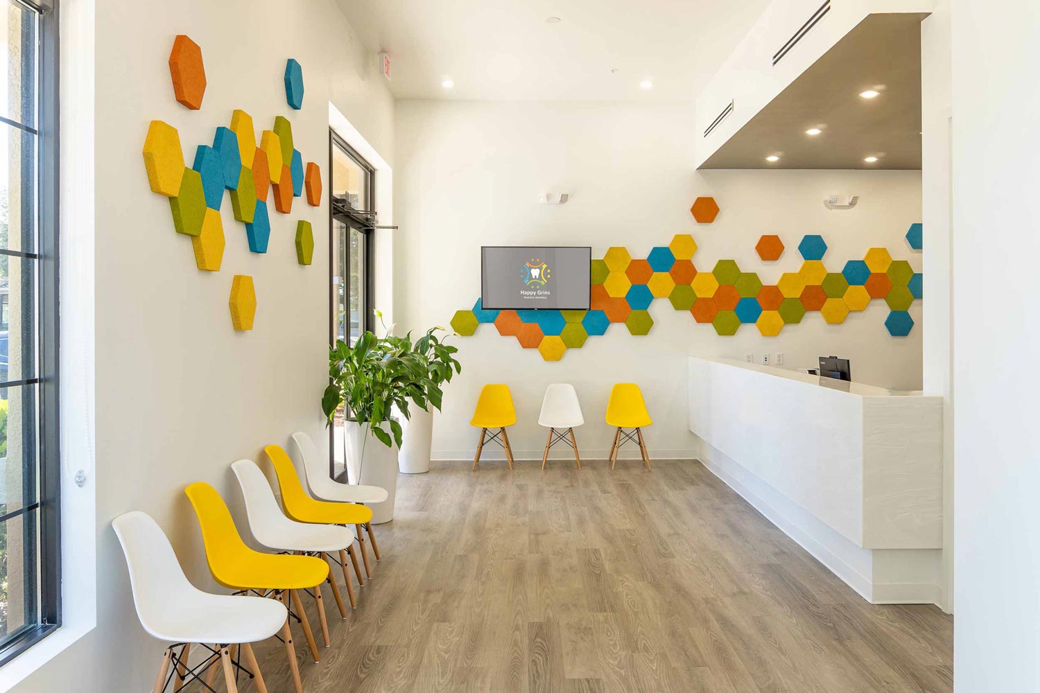 Happy Grins Pediatric Dentistry arrival area is colorful and welcoming for kids of all ages.